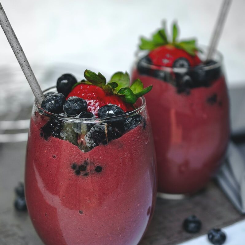 Photo by Sara Cervera two fruit shake on glasses